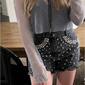 Black distressed denim shorts with rhinestone stud detailing ✨